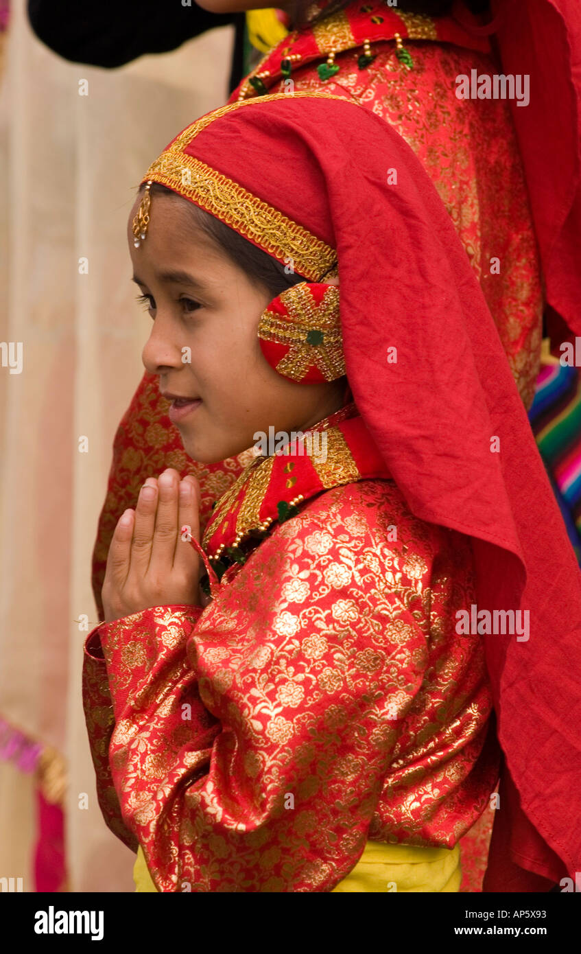 Nepalese girl wearing red dancing costume Stock Photo