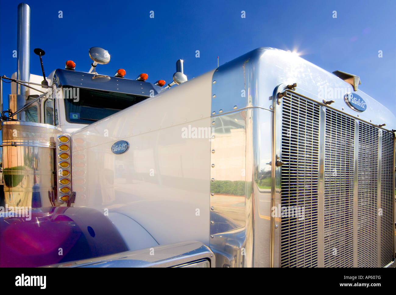 US Clean white American Peterbilt truck low wide angle close up against a blue sky. Florida. Stock Photo