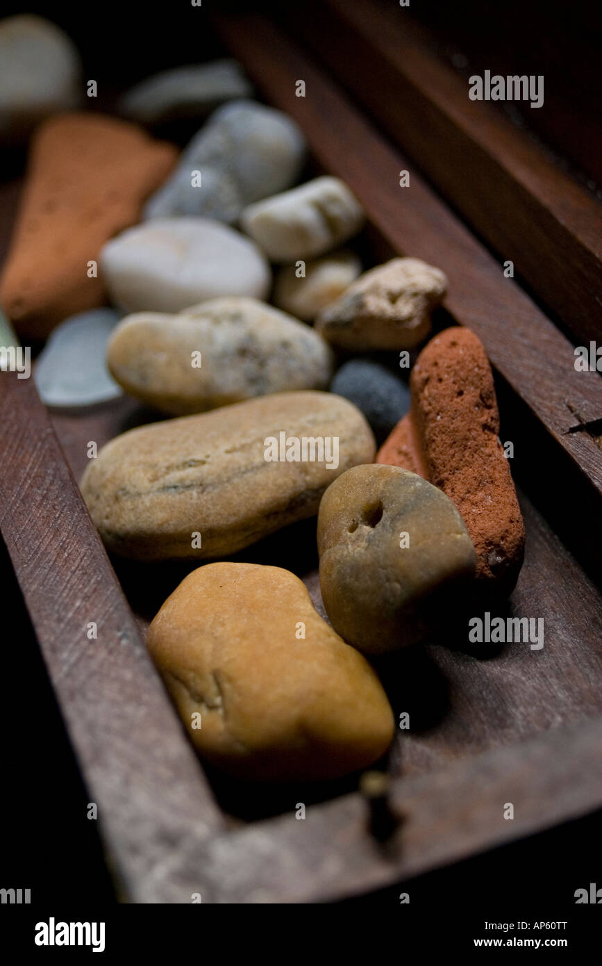 Set stones in a wooden box Stock Photo