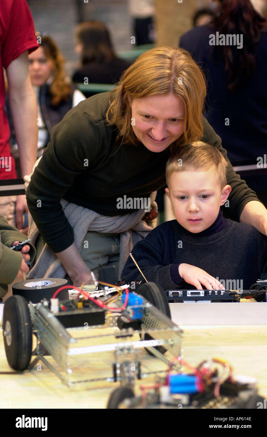 Visitors try their hand at operating radio controlled robots Stock