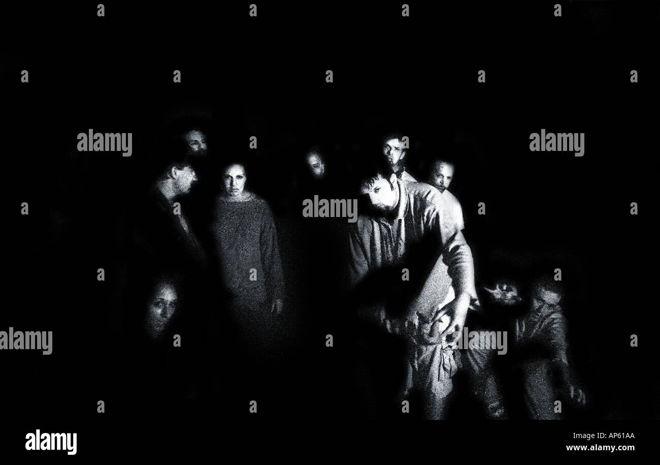 Group of Zombies coming out of darkness Stock Photo Alamy