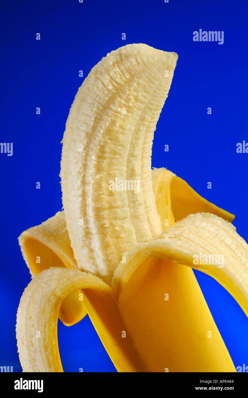 Peeled yellow banana Stock Photo Alamy