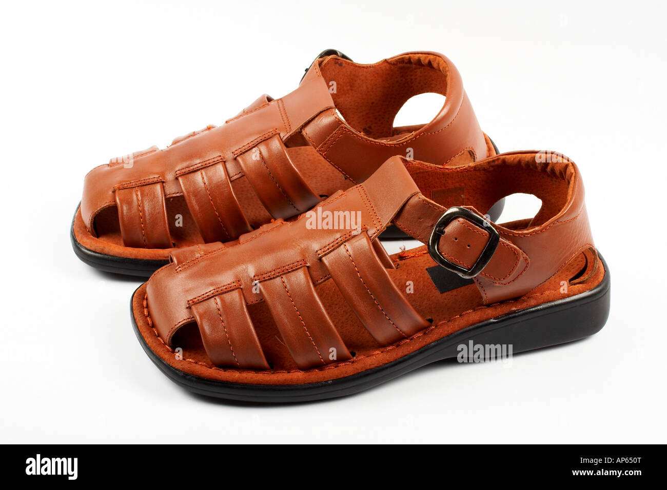 Brown leather sandals isolated on white Stock Photo