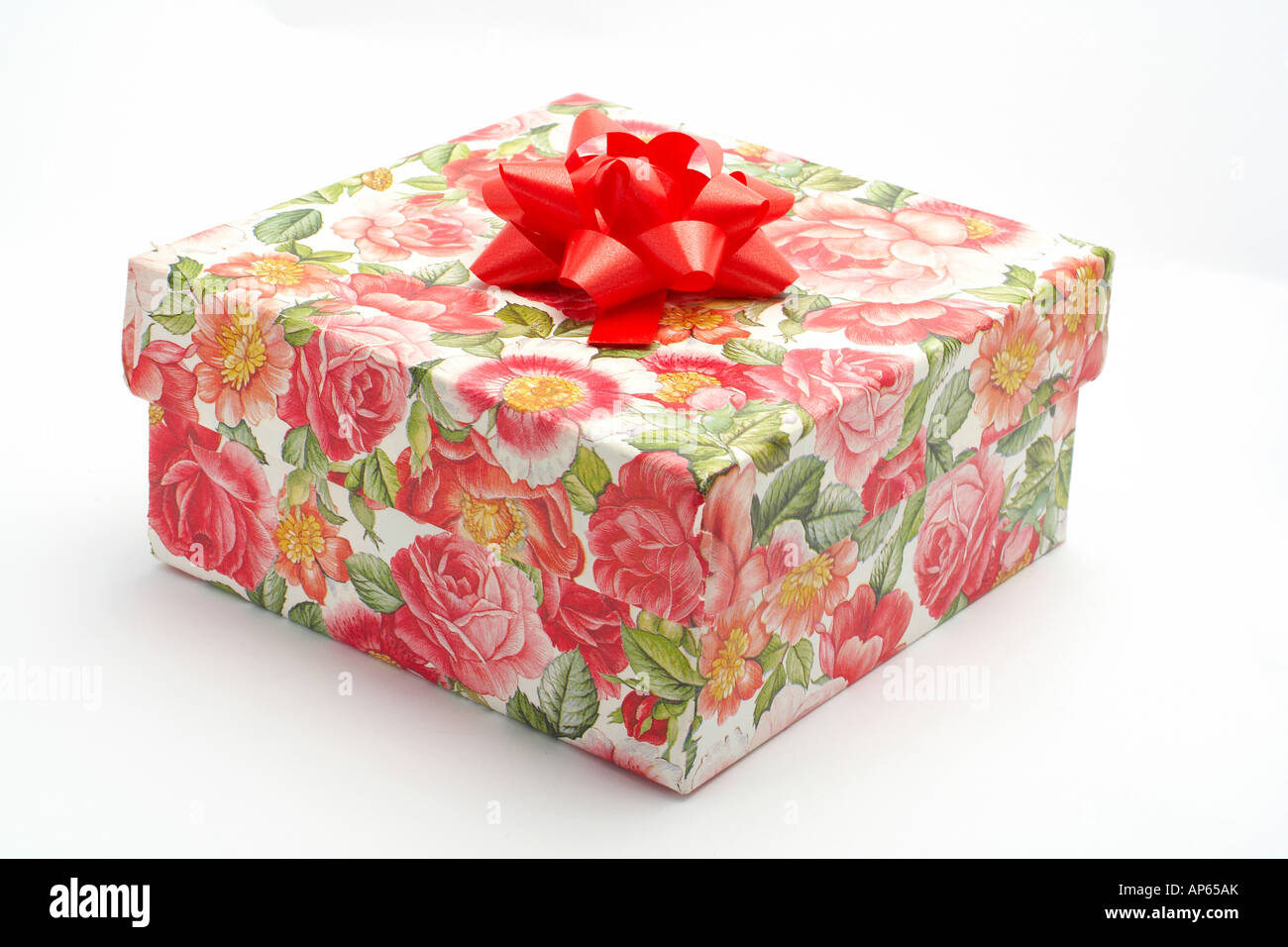 Gift box with red ribbon isolated on white background Stock Photo - Alamy