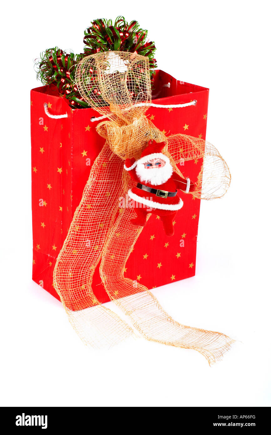 Santa Claus and red bag on white background Stock Photo - Alamy