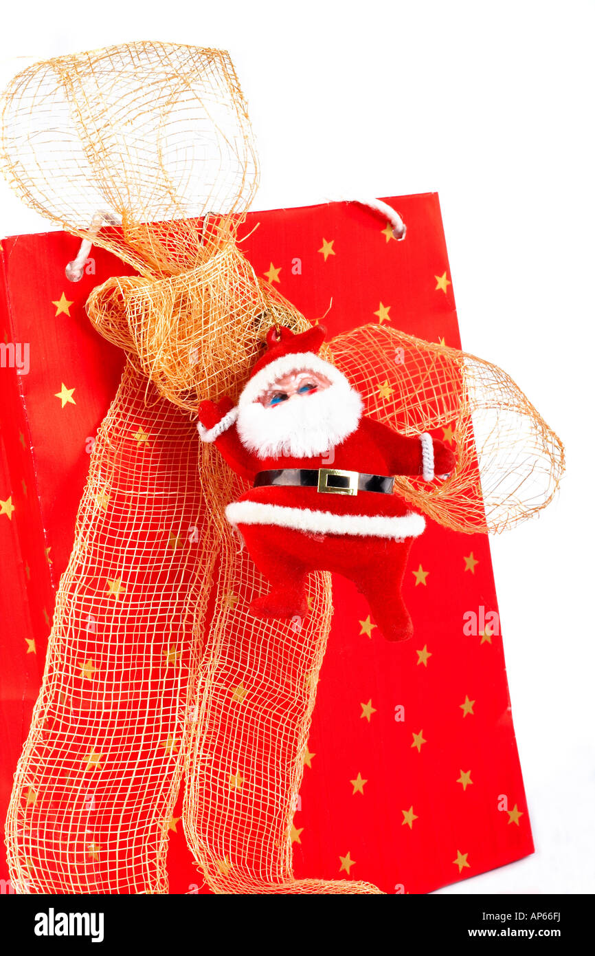 Santa Claus and red bag on white background Stock Photo - Alamy
