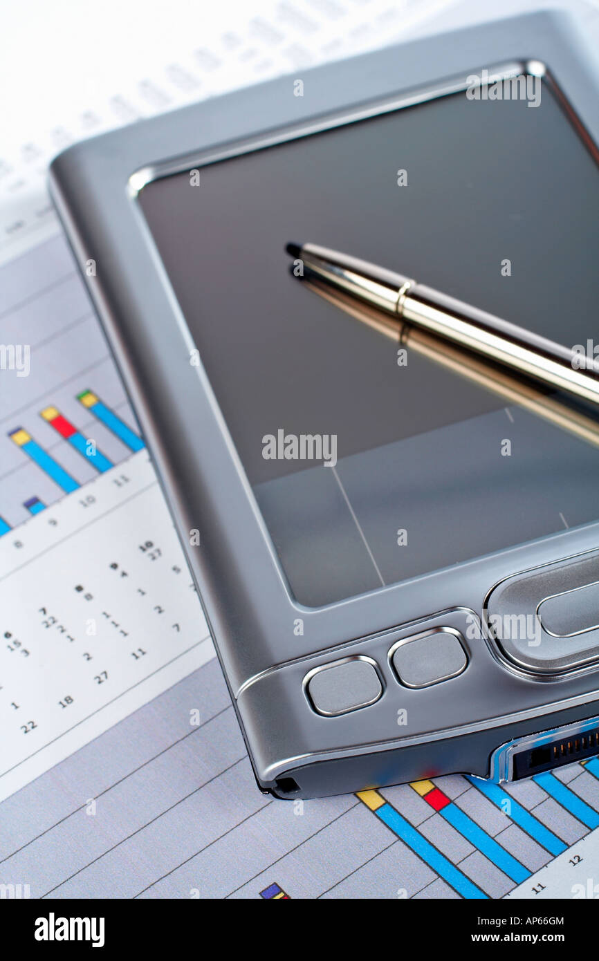 PDA on market business financial chart background Stock Photo Alamy