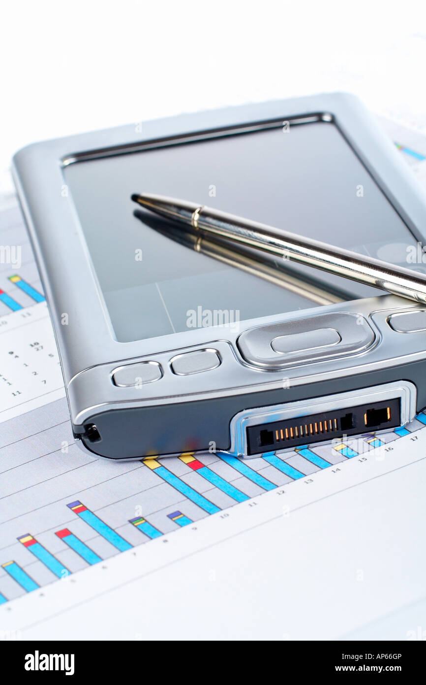 PDA on market business financial chart background Stock Photo Alamy