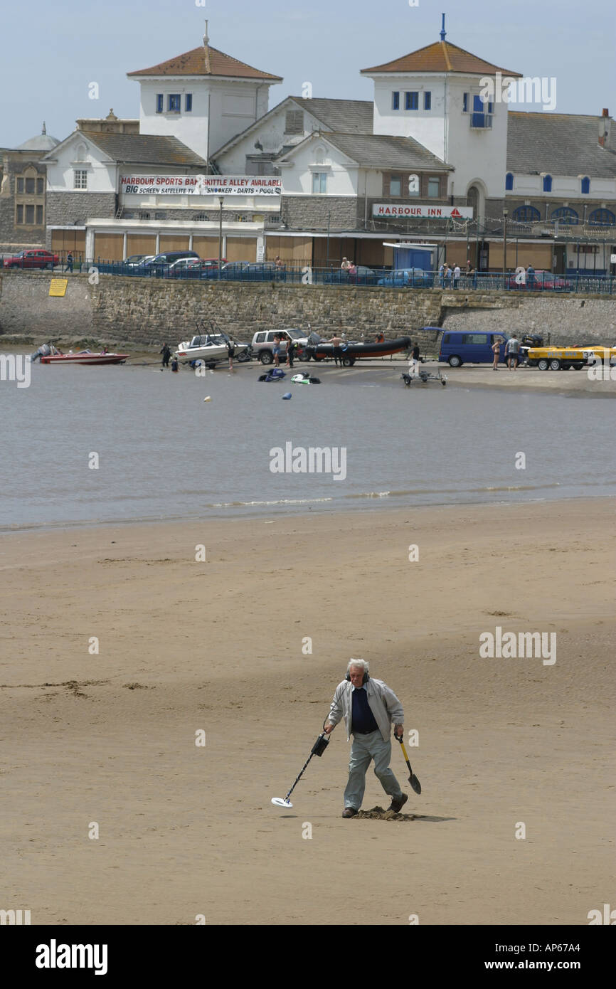 A metal detectorist on the beach at Weston super Mare Stock Photo Alamy