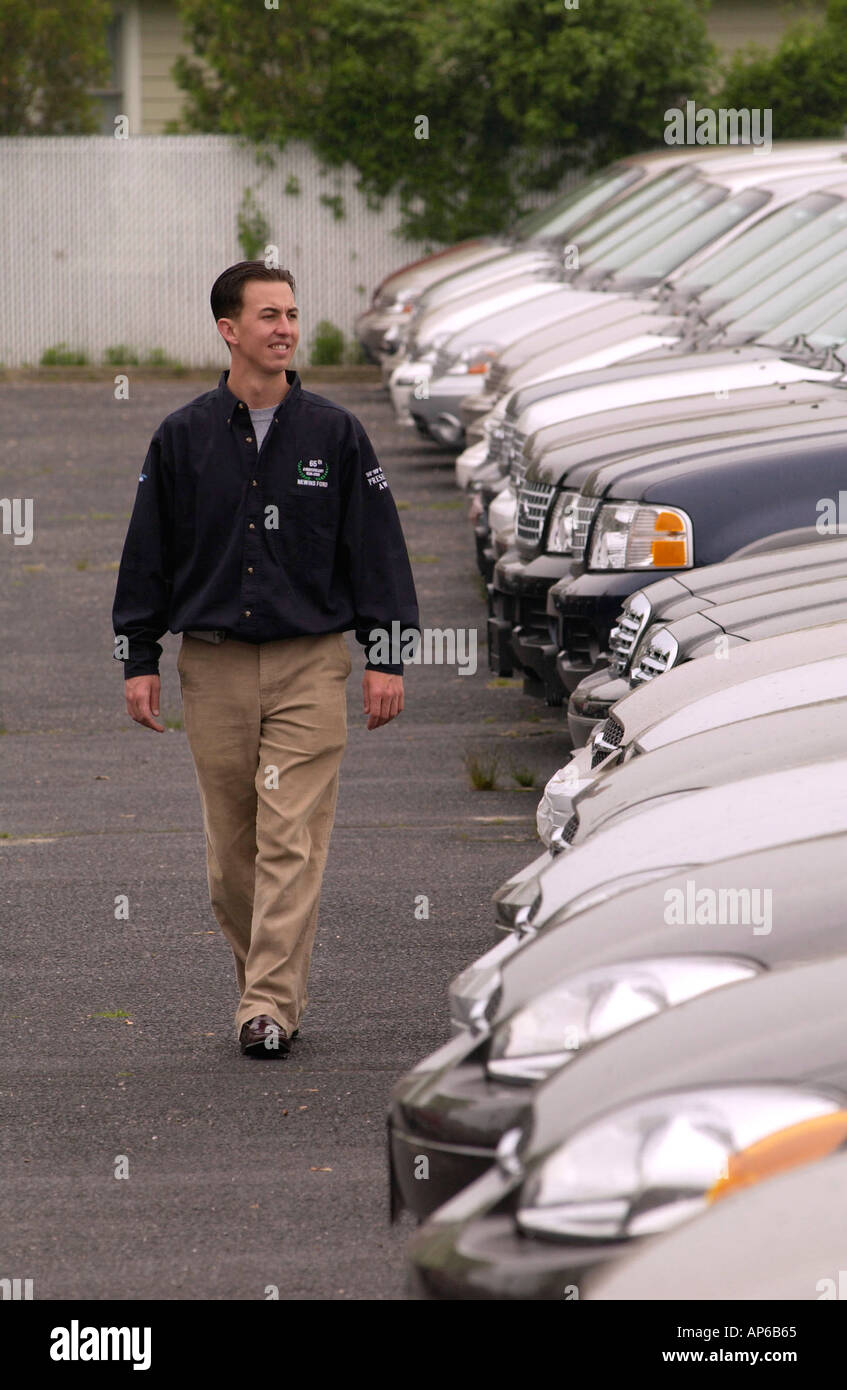 Bay Shore NY 060703 Shaun Blanco Saleen Sales Consultant at Newins Bay Shore Ford in Bay Shore NY walks the new car lot Saturday morning Stock Photo