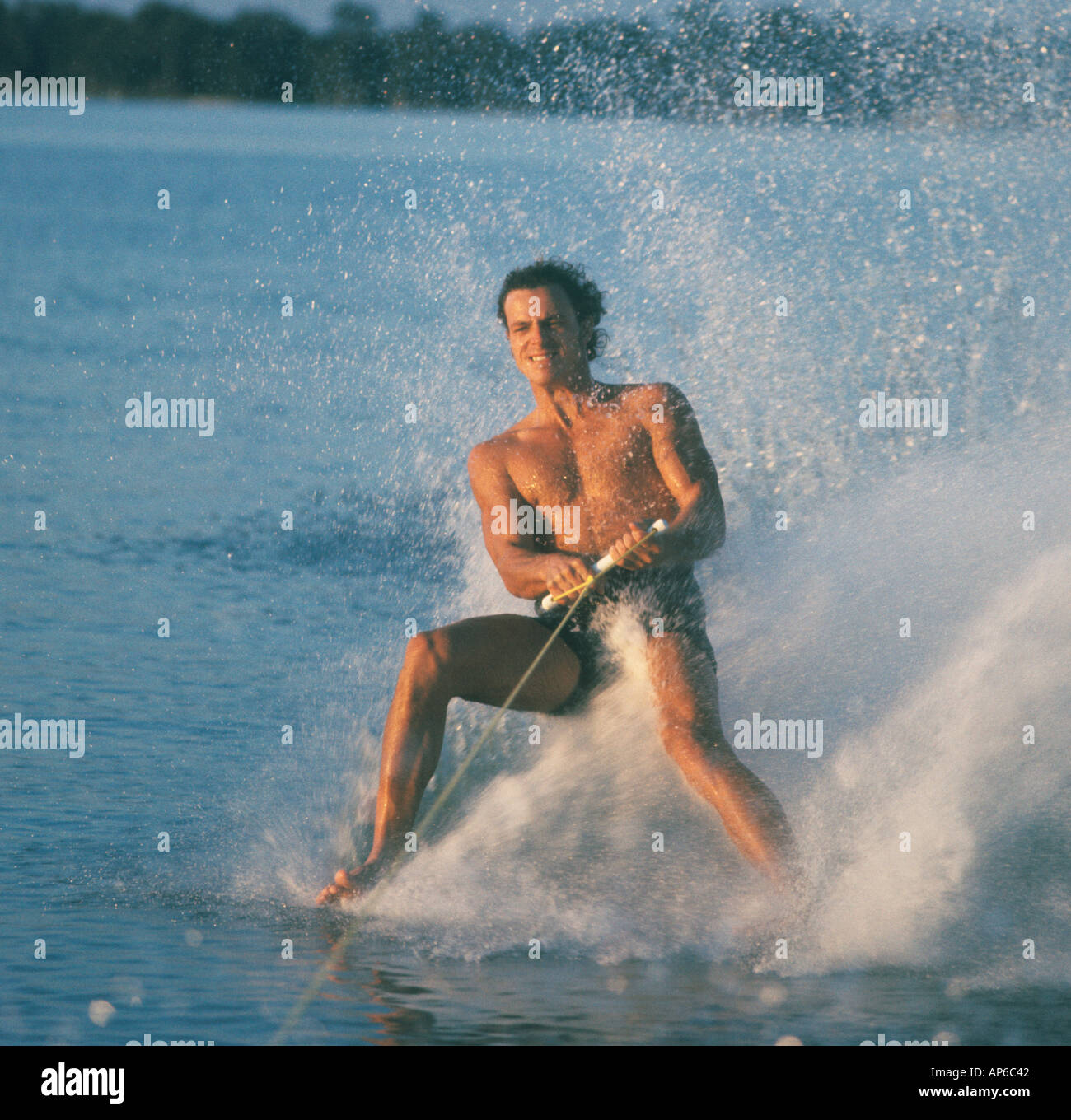 man water skiing on bare feet Stock Photo Alamy