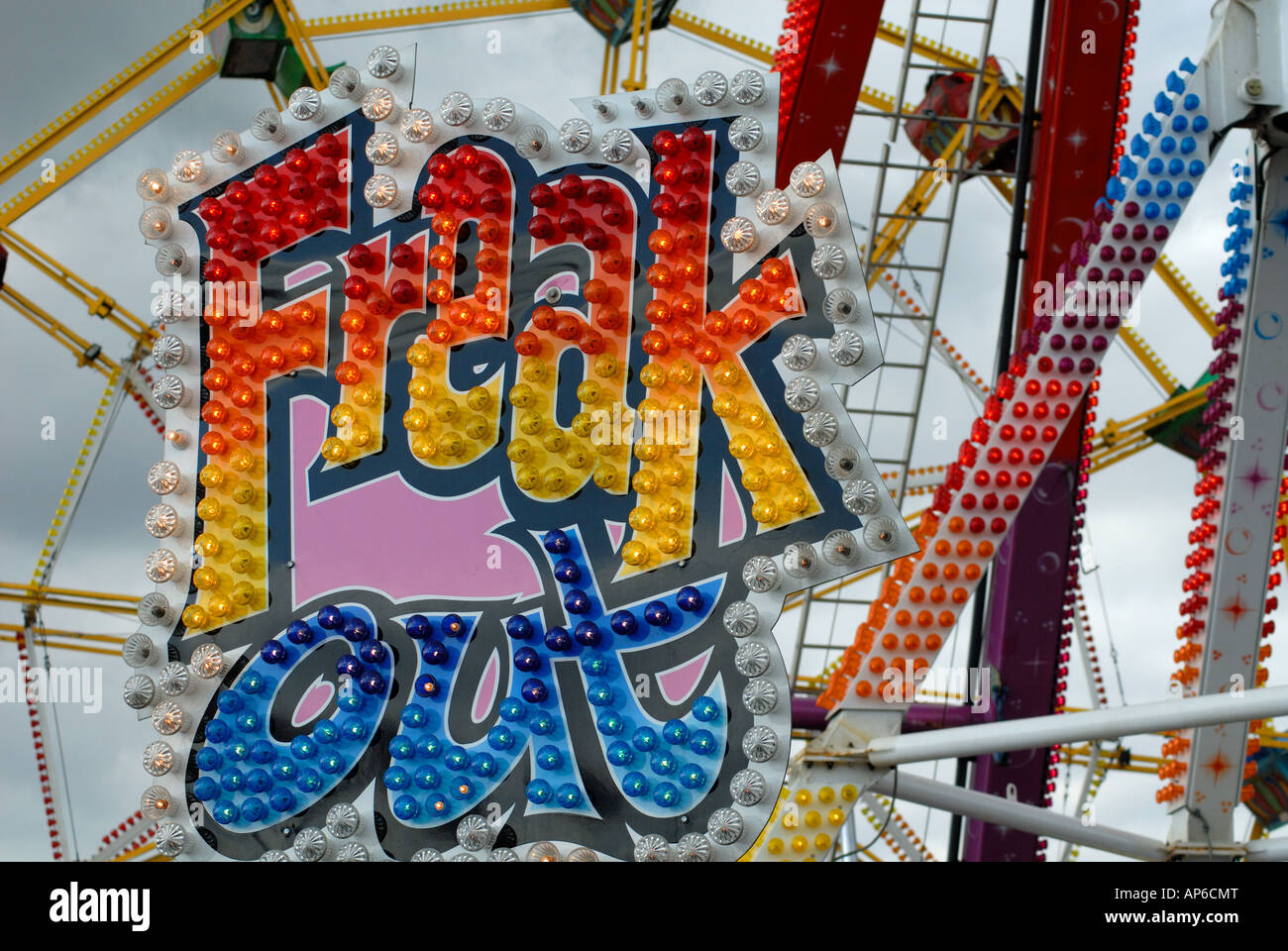 A fairground ride with the words freak out Stock Photo
