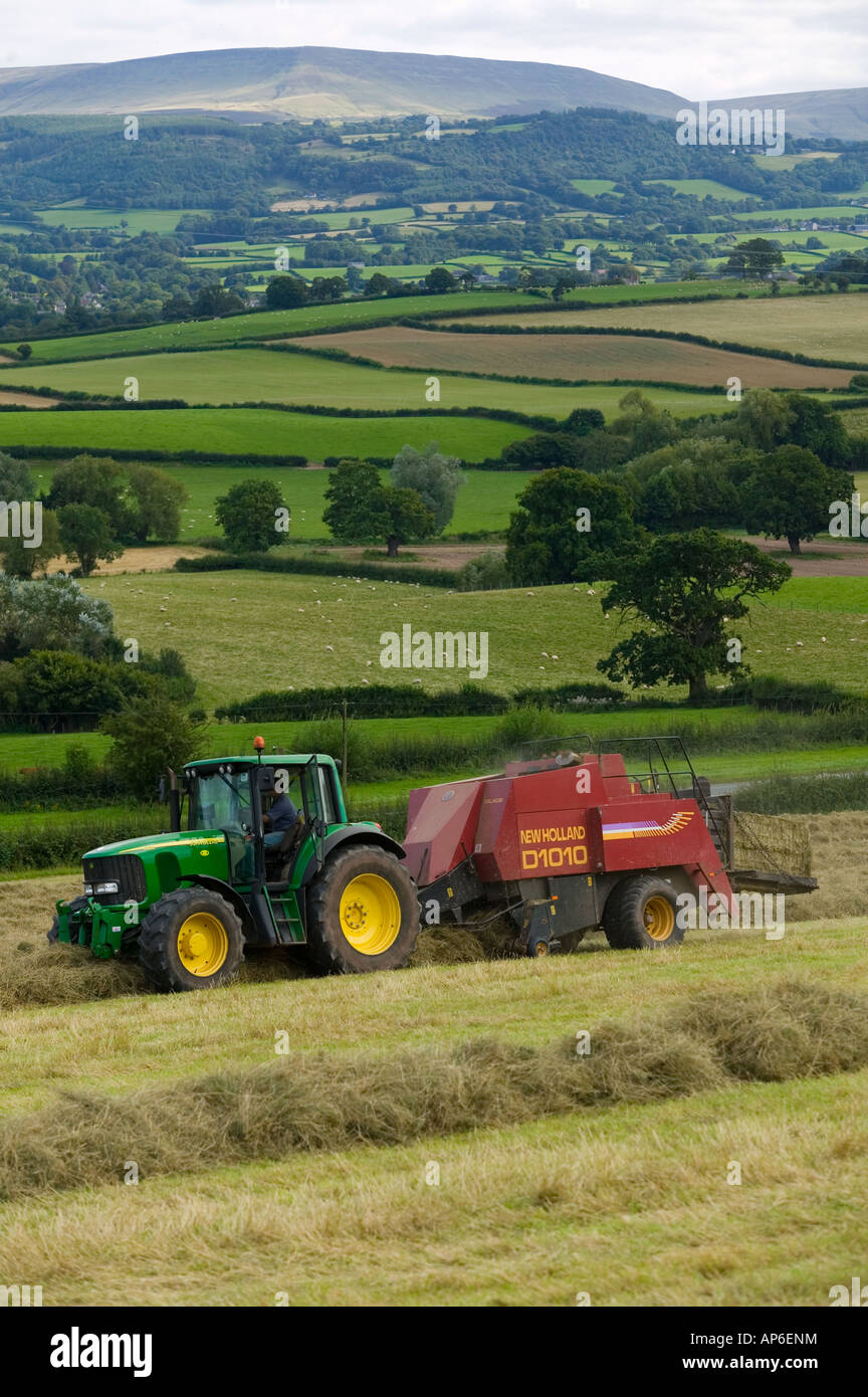 square baler at work in a radnorshire field Stock Photo