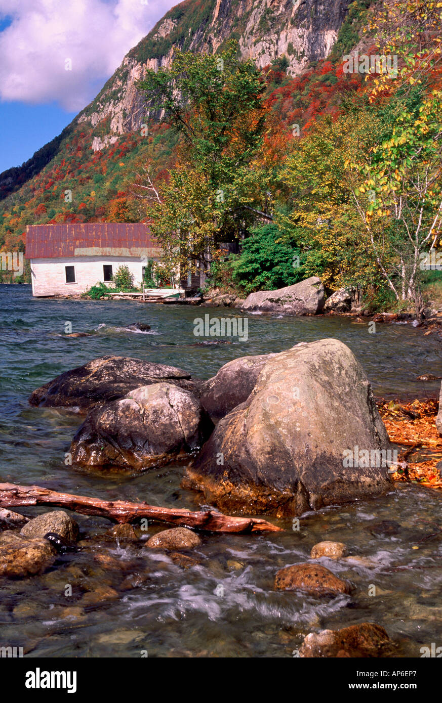 USA, Vermont, Lake Willoughby, House and autumn hillside at lakeside