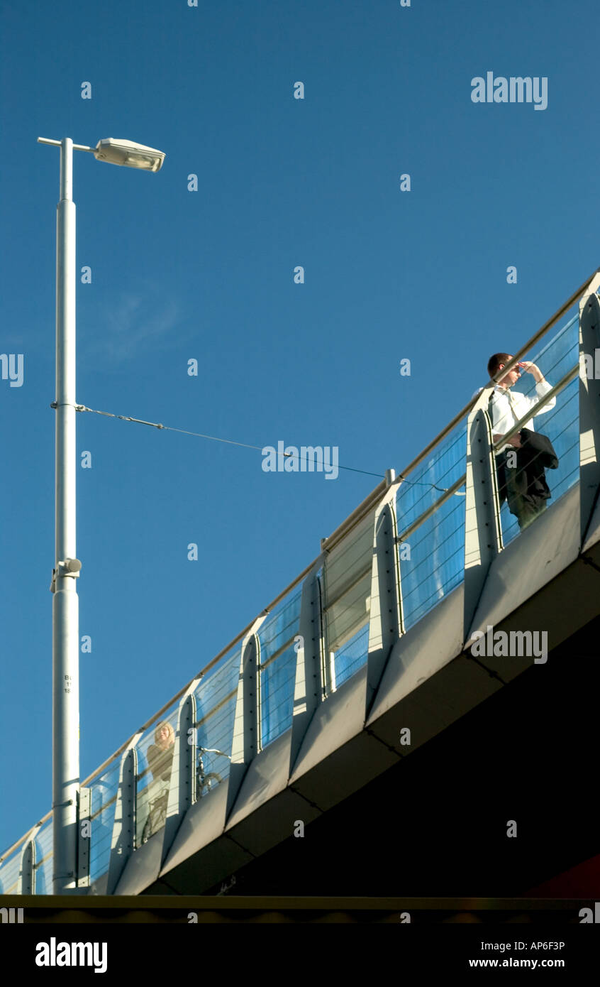People waiting at the Ranelagh Luas stop in south Dublin city, Ireland Stock Photo