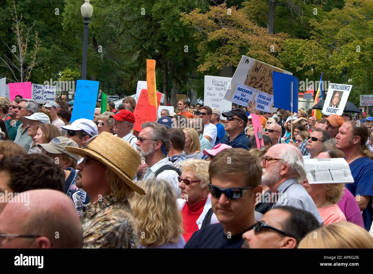 A crowd of people holding signs at an Anti war protest in Salt Lake City Utah 8 22 2005 Stock Photo