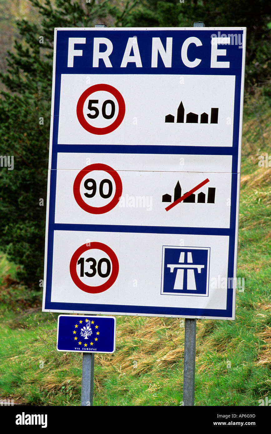 Speed limit signs at the French Italian border  Stock Photo