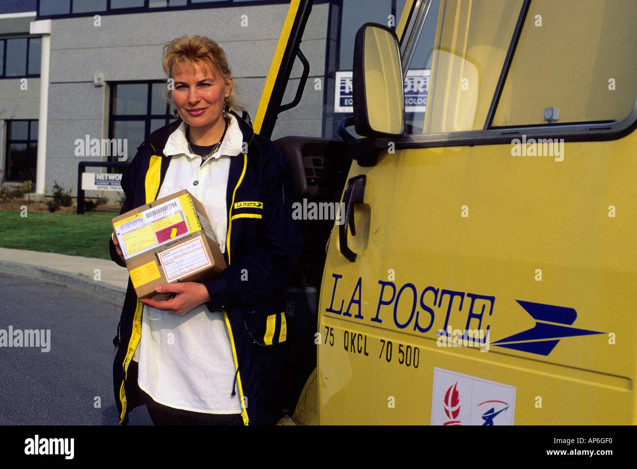 French female postal employee France Stock Photo Alamy