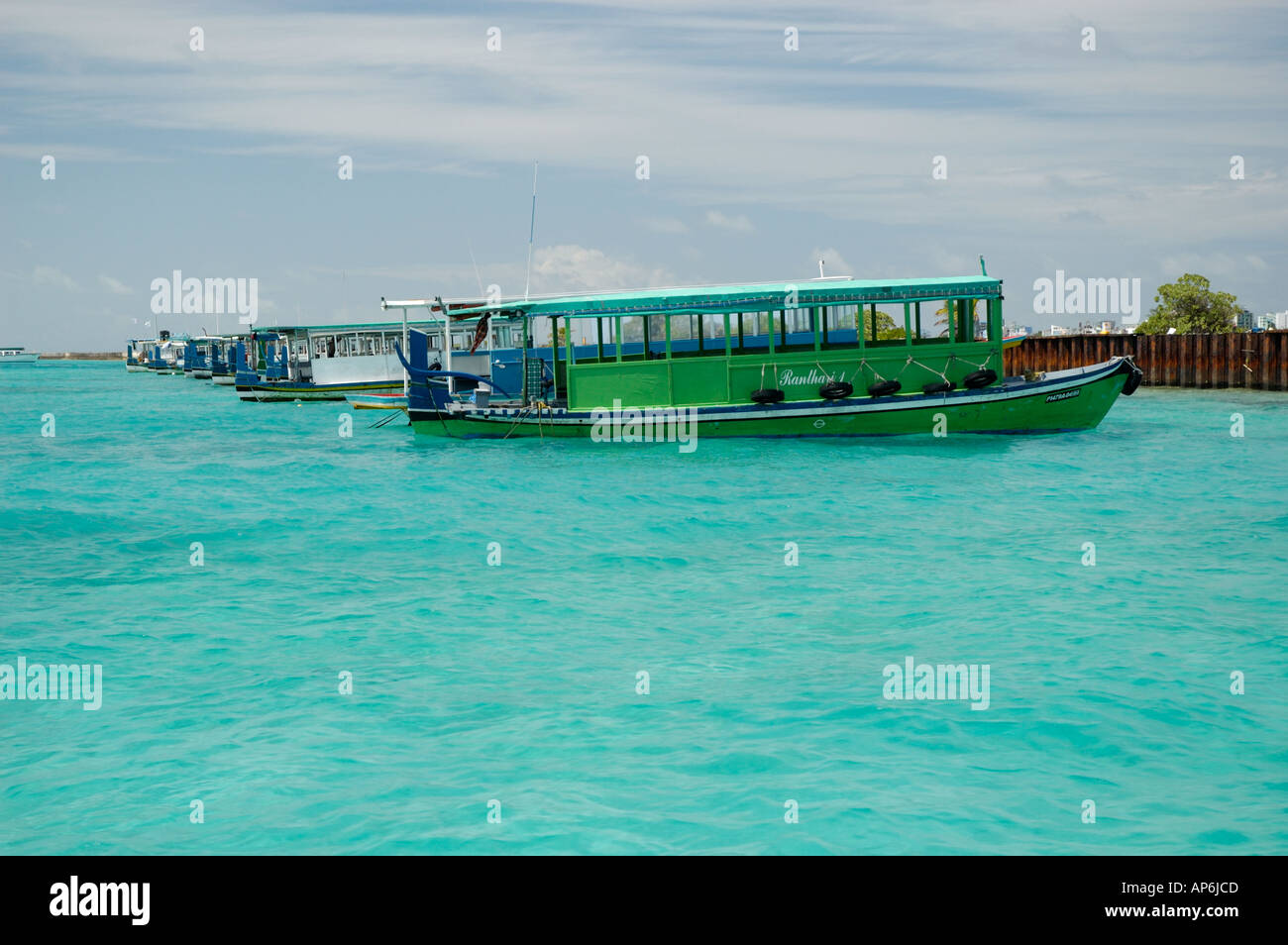 Water taxis lined up in the harbour at Male International Airport