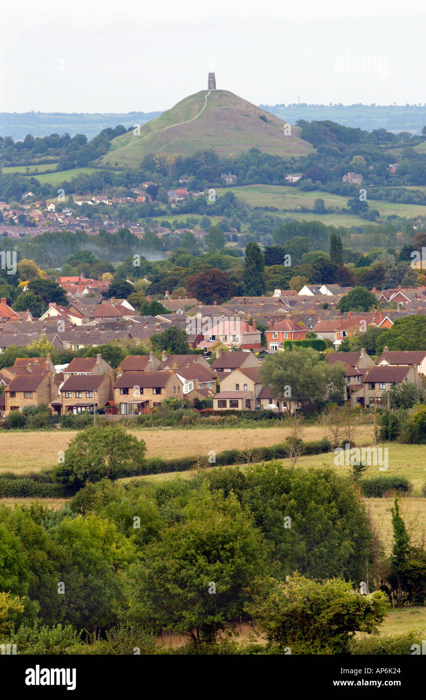 Glastonbury Tor rising from the landscape viewed over housing estates