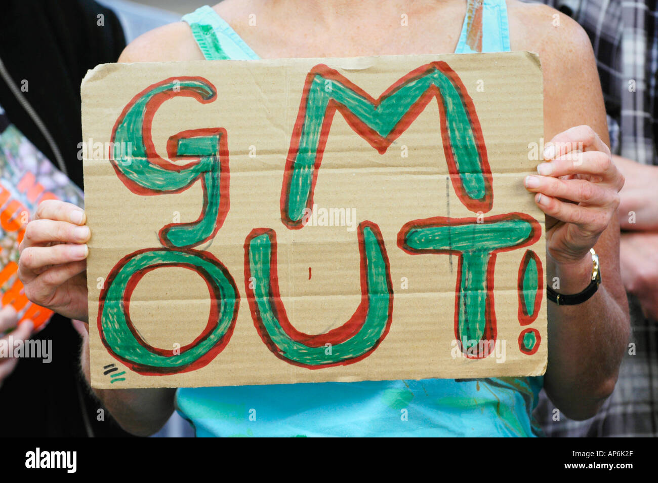 Supporters of Greenpeace protesting against growing GM crops in Wales demonstration Cardiff South Wales UK Stock Photo