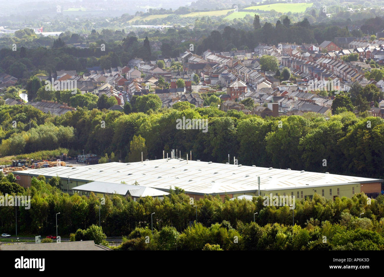 View over industrial factory with housing beyond at Griffithstown near