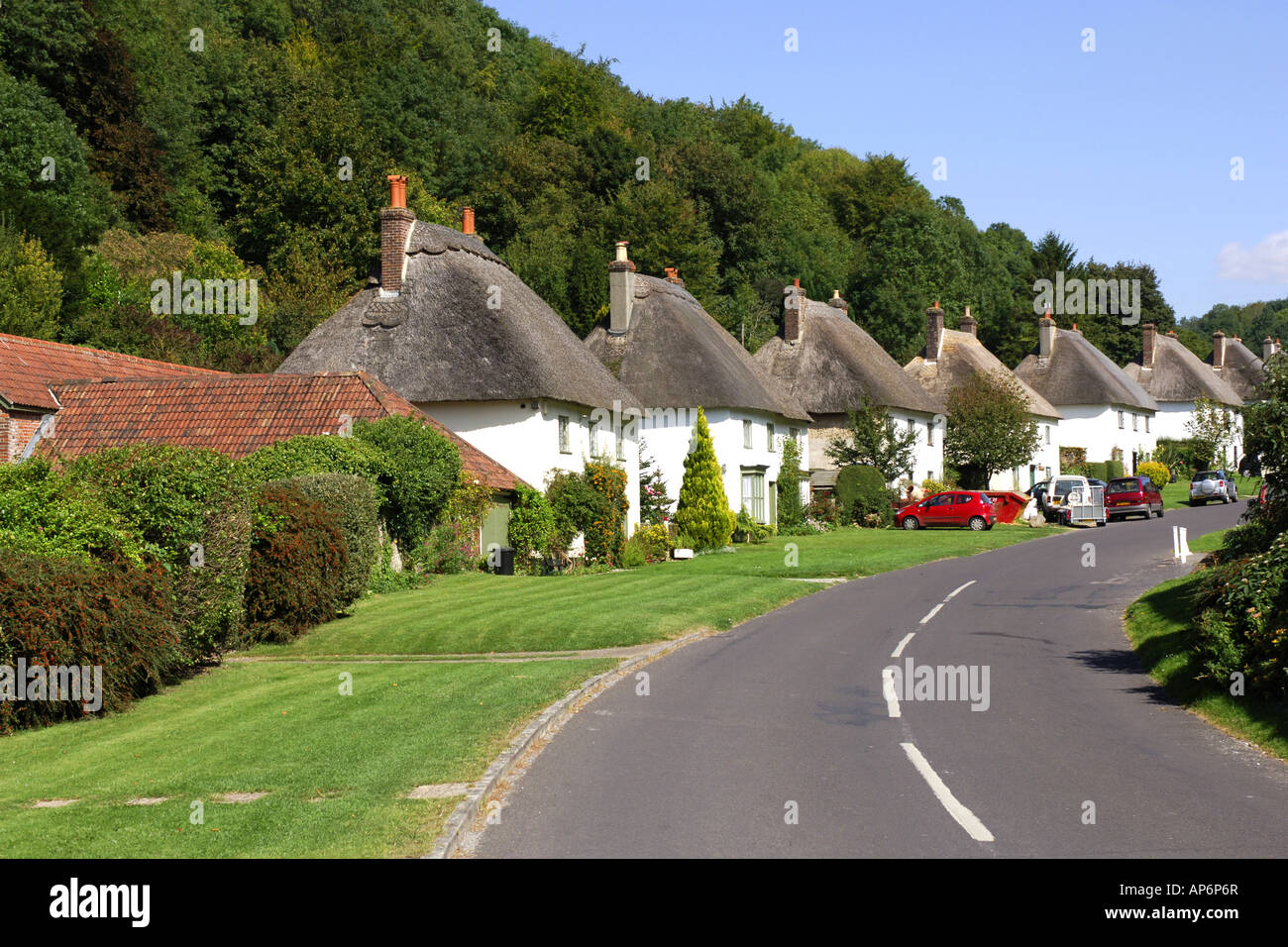 The picturesque thatched roof cottages of Milton Abbas Village Dorset