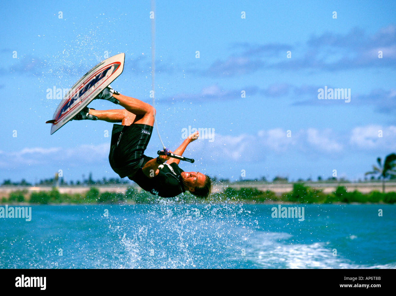 Man in midair stunt on wakeboard, Hawaii Stock Photo Alamy