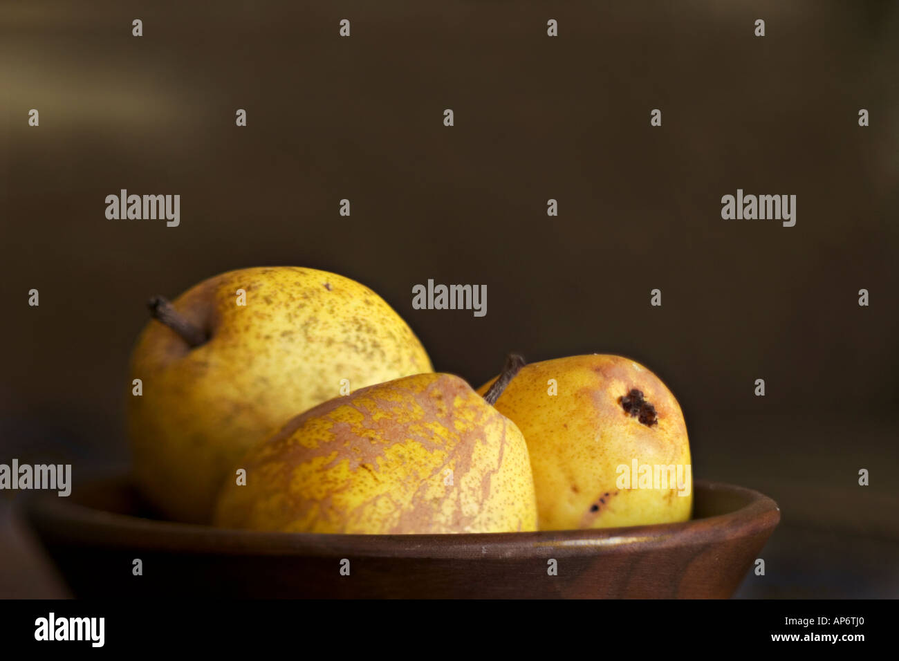 three pears on dark background Stock Photo