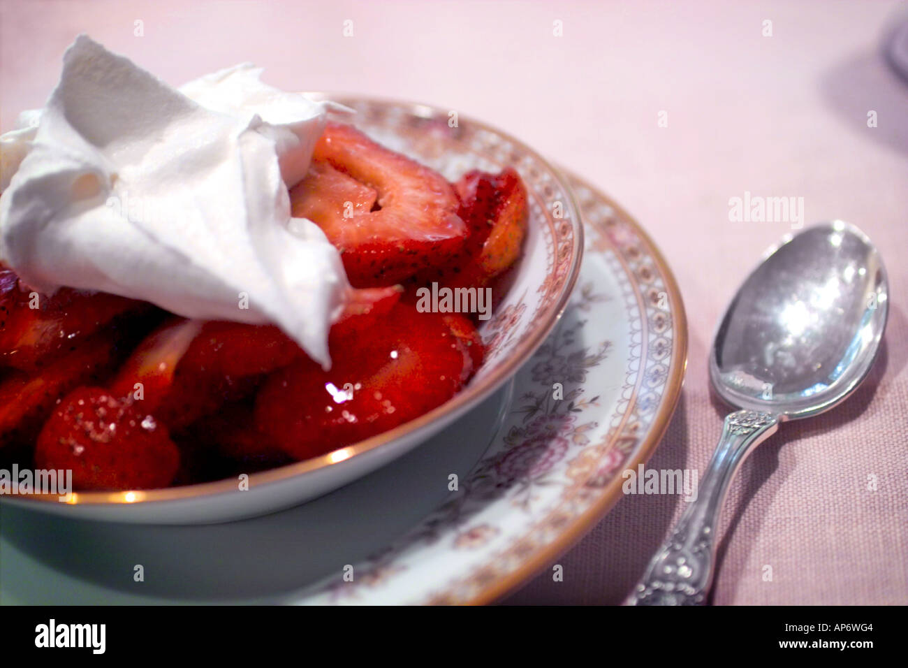 bowl of strawberries and whipped cream Stock Photo