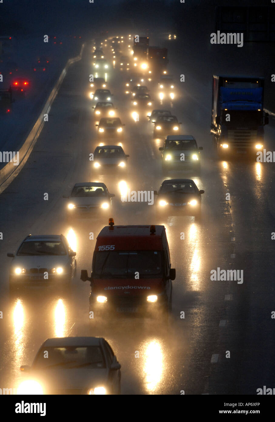 HEAVY NORTHBOUND TRAFFIC ON THE M6 MOTORWAY NEAR JUNCTION 12,CANNOCK IN HEAVY RAINFALL.UK Stock Photo