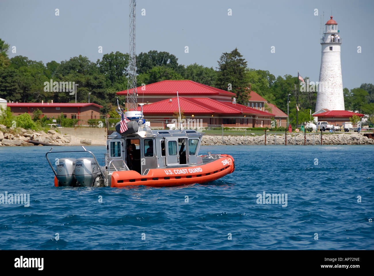 Police on boats patrol the waters of the St Clair River Michigan