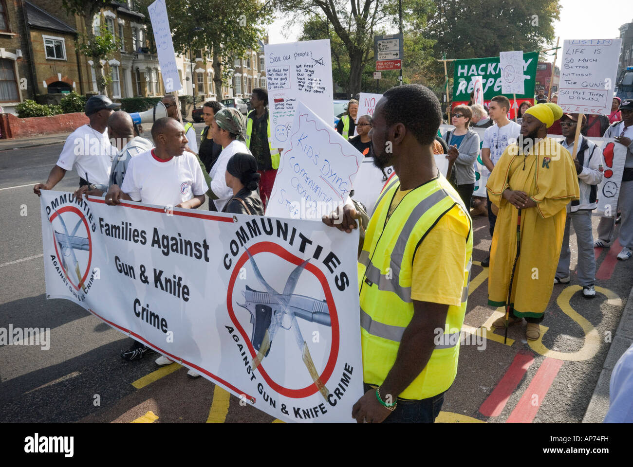 Community March Against Gun And Knife Crime In Hackney London Goes Along A Street Notorious For Several Murders Stock Photo Alamy