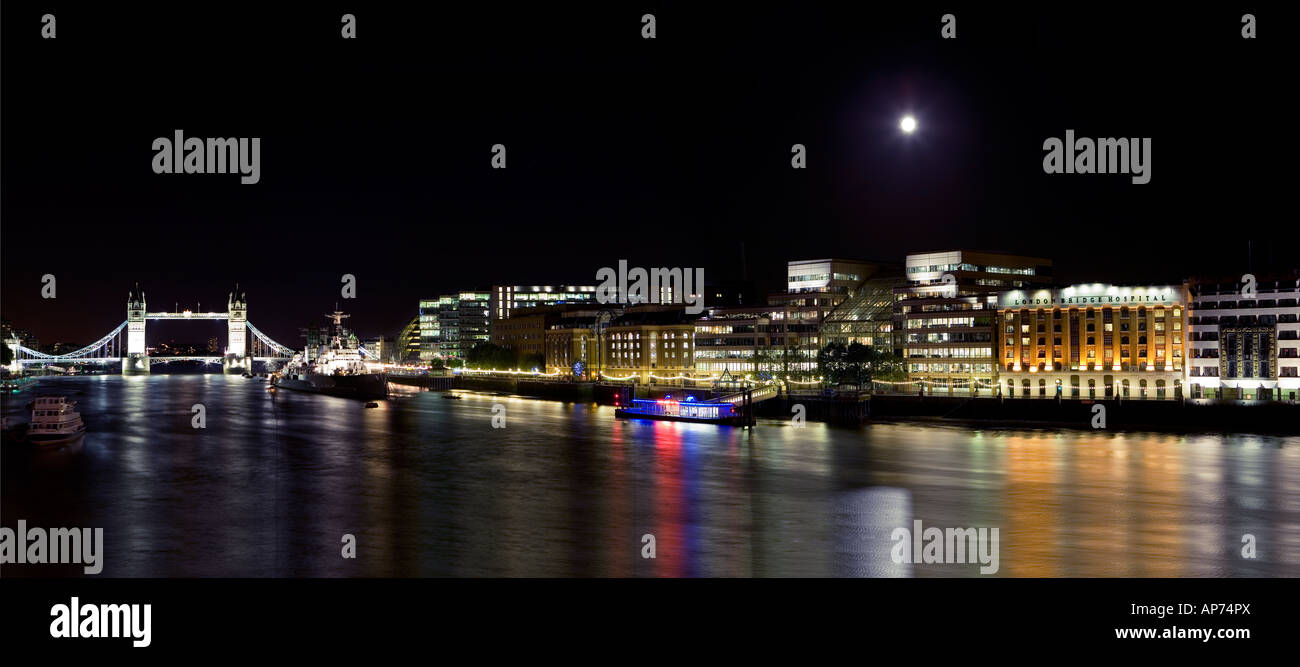 View East of Tower Bridge and London Bridge Hospital by Night Stock Photo