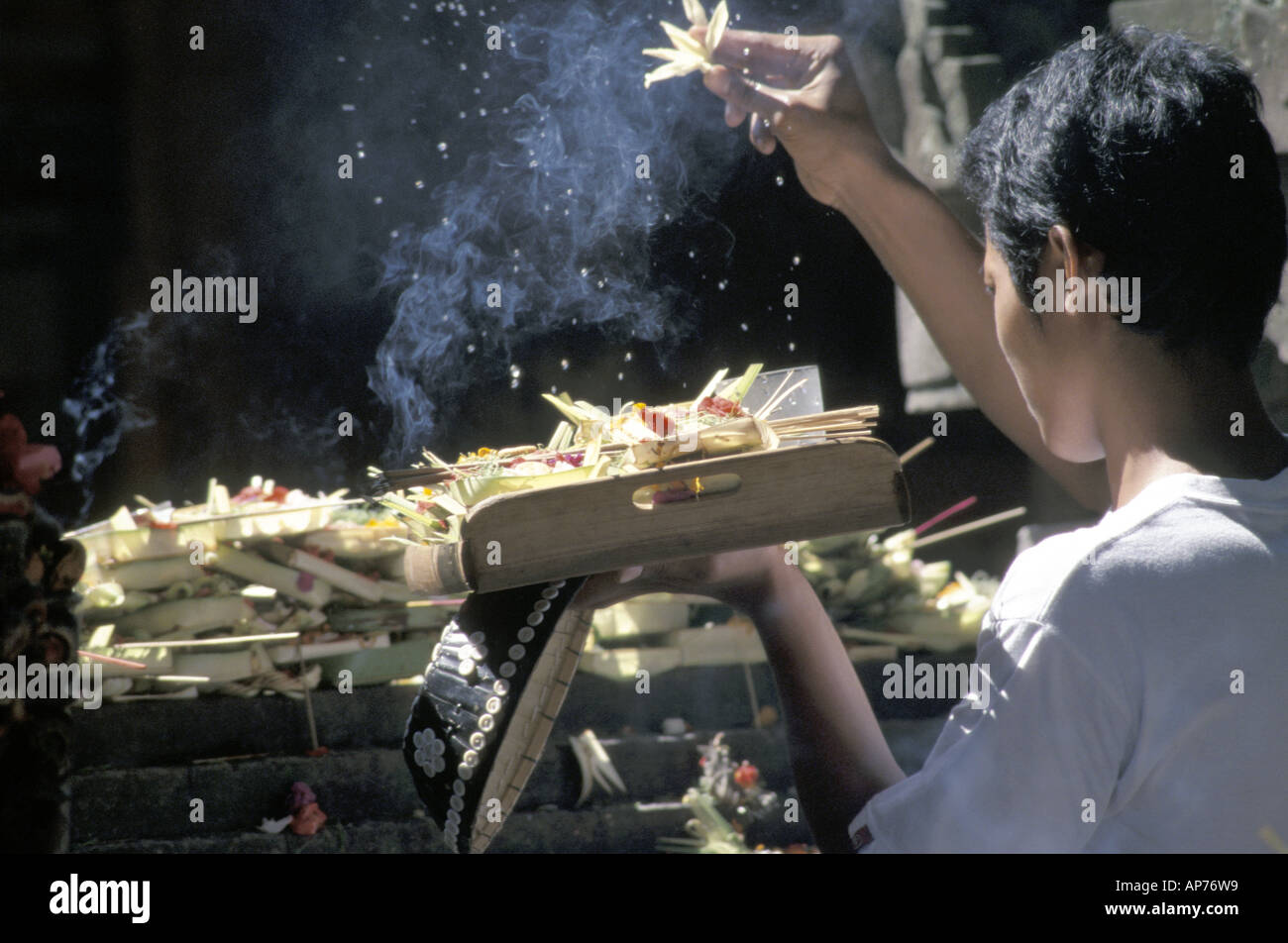 Hindu balinese incense sticks offering hi-res stock photography and ...