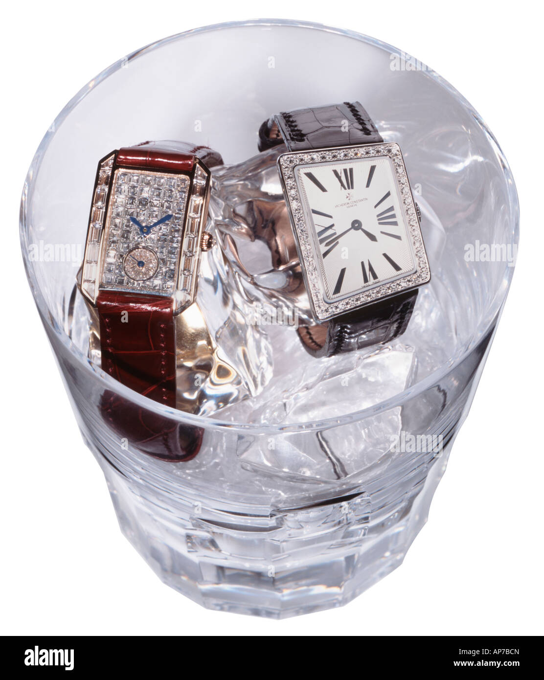 Watches in a cocktail glass Stock Photo
