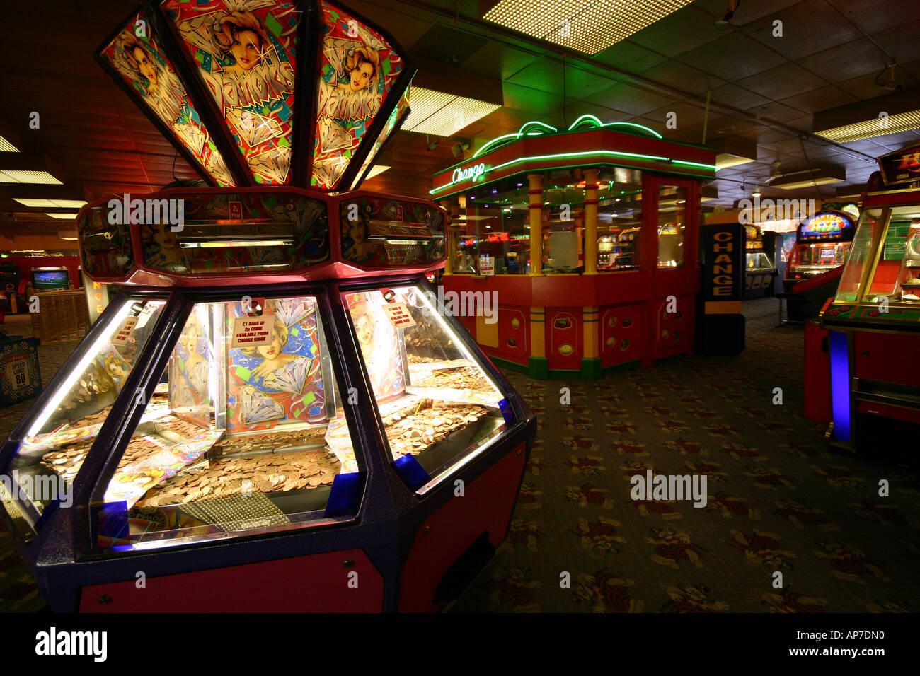 Amusement arcade with coin cascade machine Stock Photo - Alamy