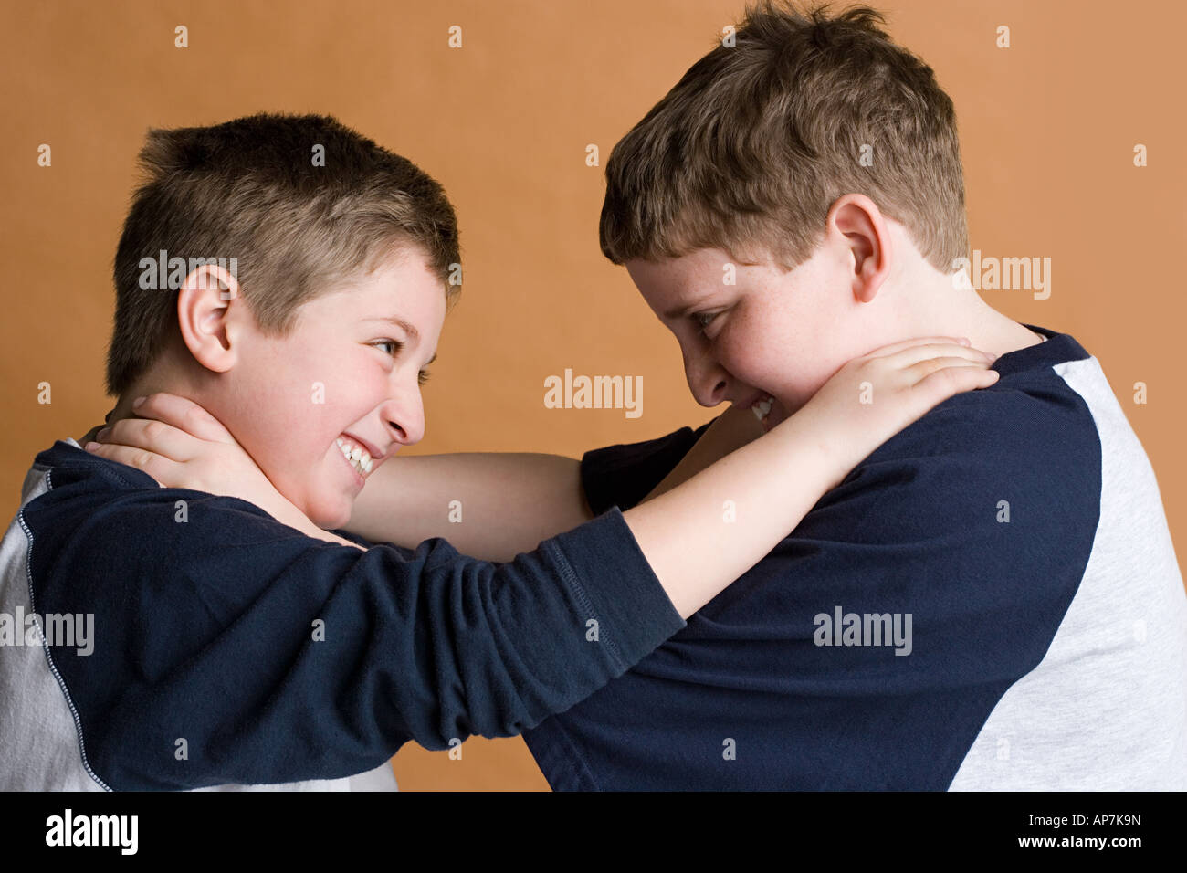 Boys strangling eachother Stock Photo