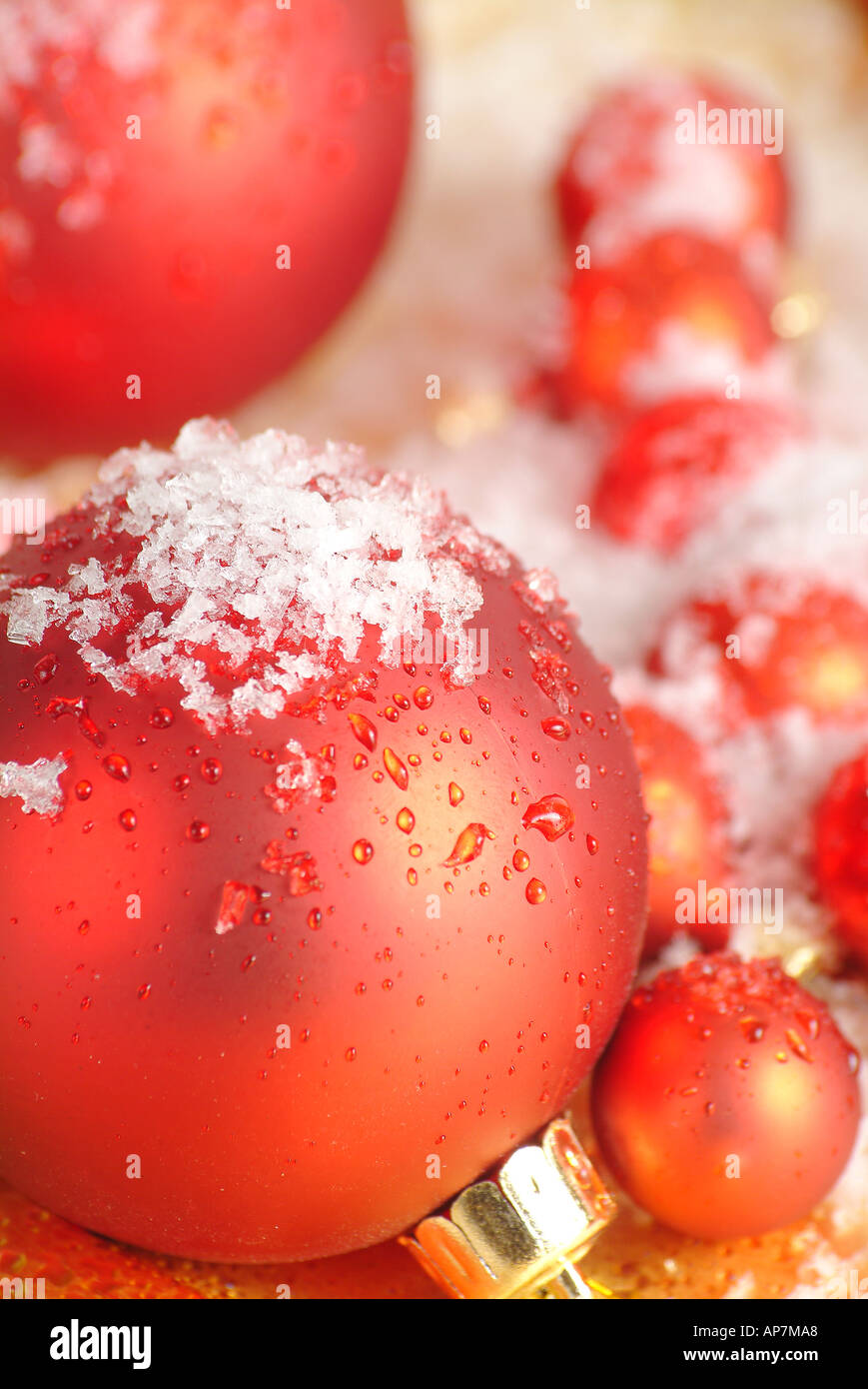 A selection of red gold and white Christmas decorations Stock Photo