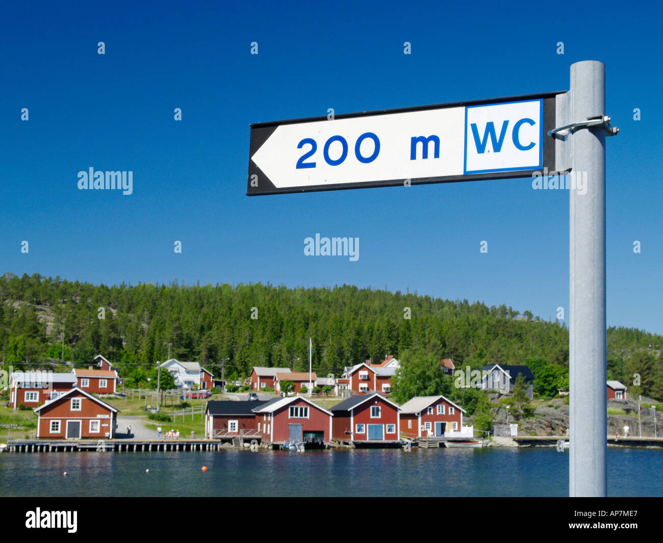 Höga Kusten, swedish village, sign 200m WC Stock Photo
