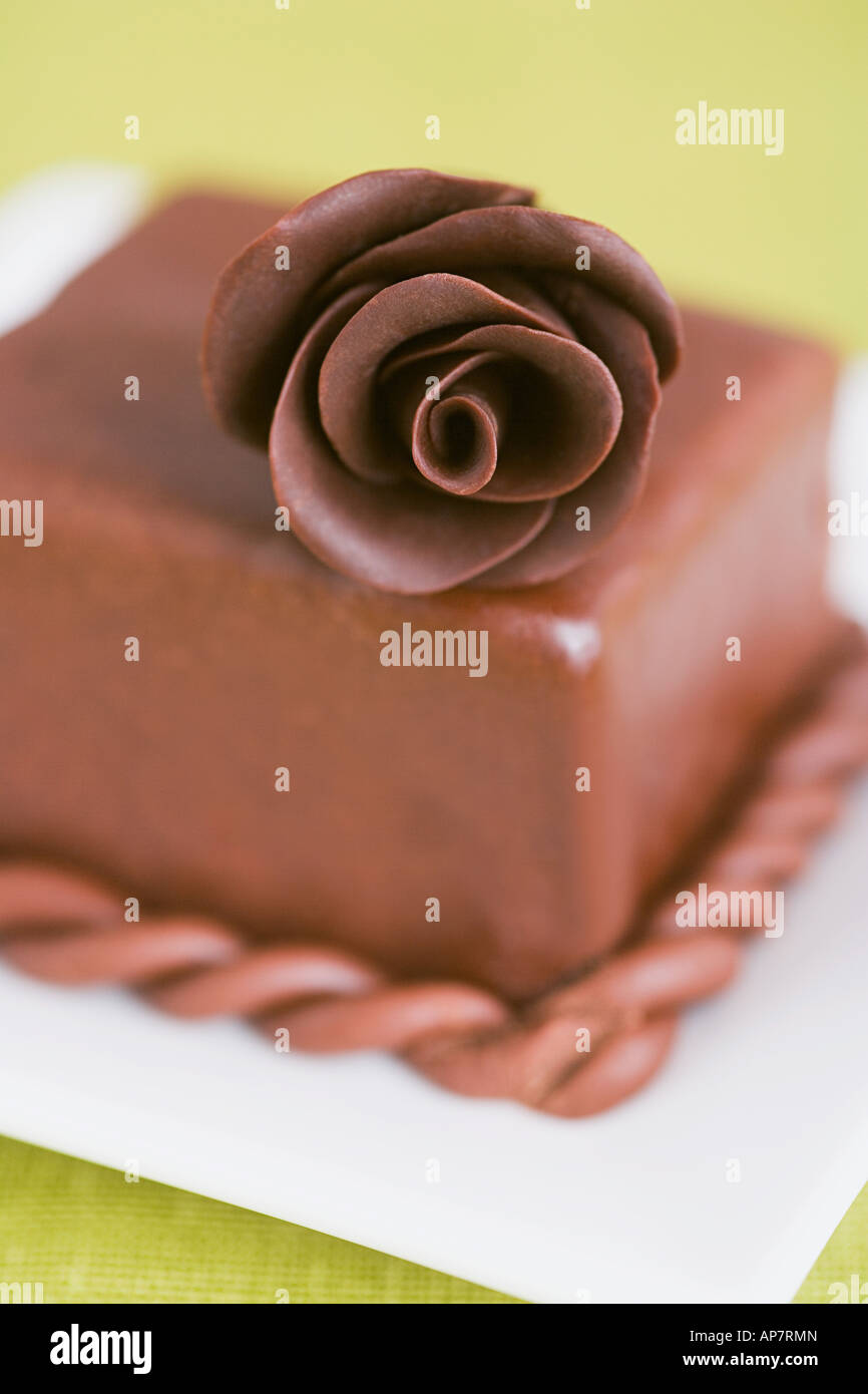 A chocolate rose on a cake Stock Photo