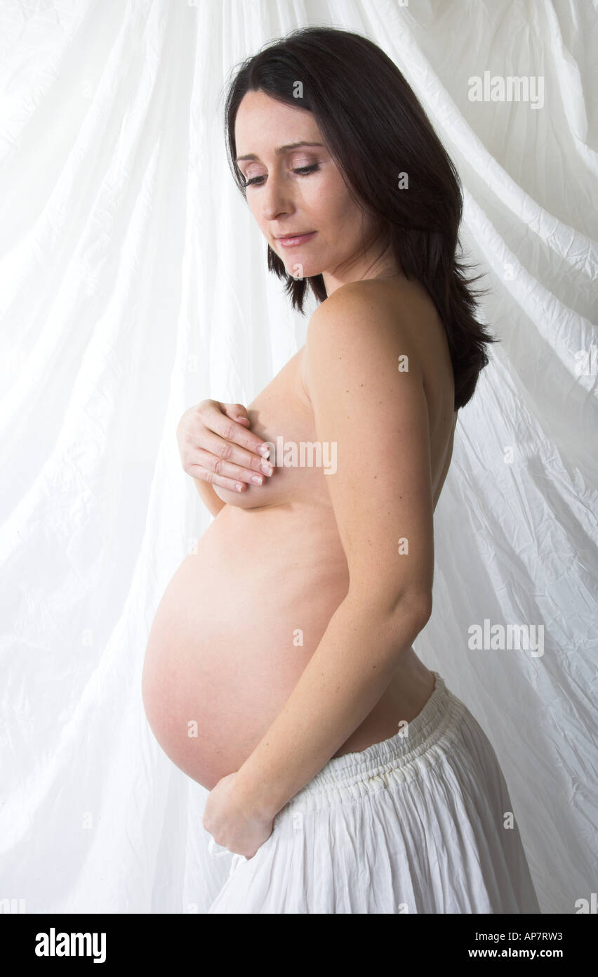Hands over her chest hi-res stock photography and images - Alamy