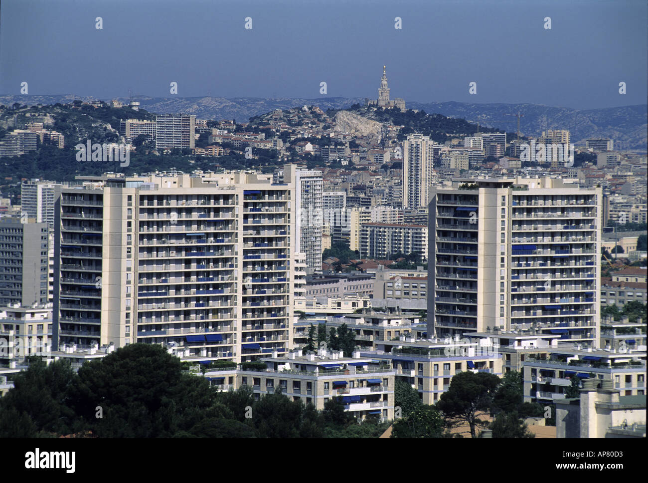 France Marseille Buildings In The 8Th District With Notre Dame De La Garde Basilica In The Background Viewed From The Redon Stock Photo