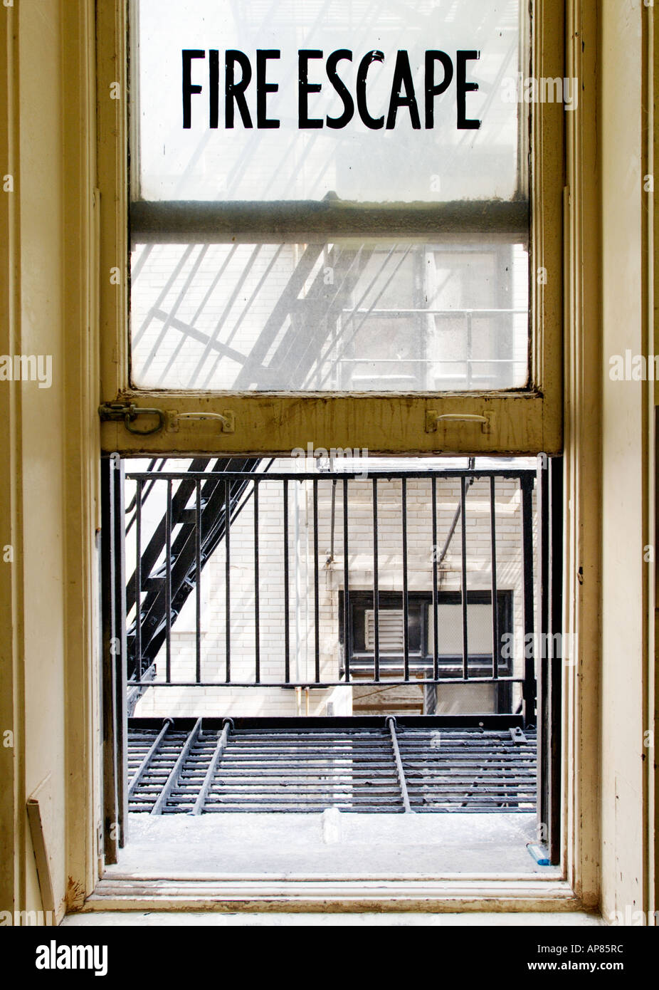 Fire escape window open to outdoors Chicago Illinois USA Stock Photo