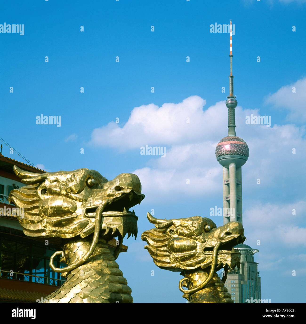 Communication Statues Close-up of statues in front of communications tower, Shanghai, China ...