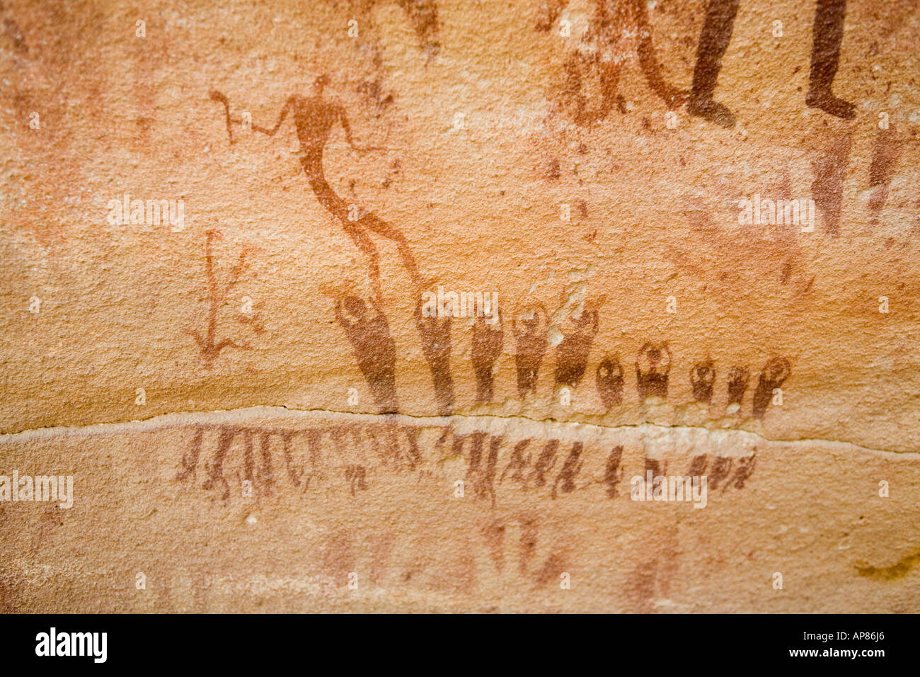Line of dancing figures - Rock art, Mestekawi Cave, Gilf Kebir, Egypt's Western desert. Stock Photo