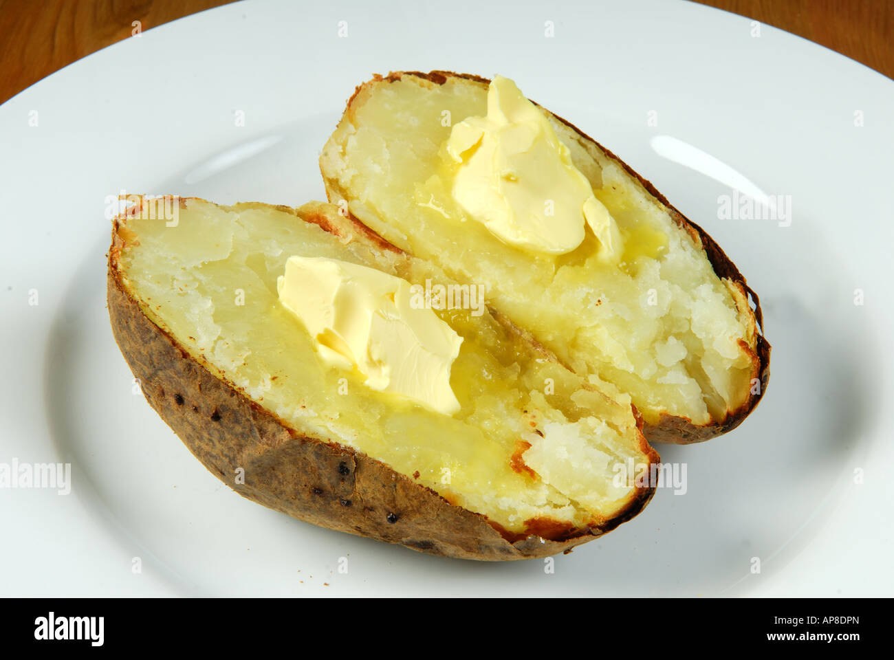 Jacket Potato and Butter Stock Photo Alamy
