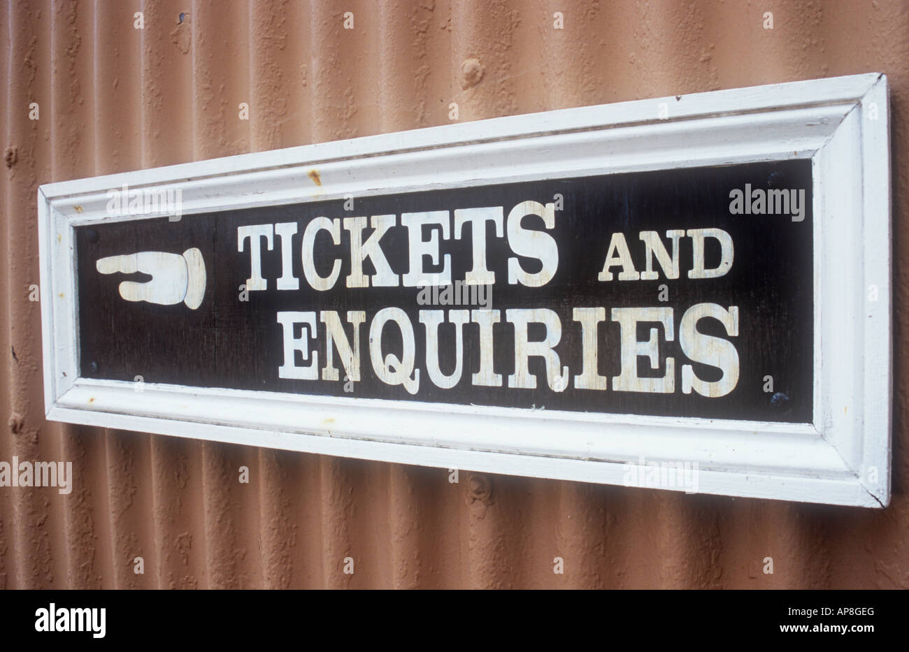 Old-fashioned skilfully hand-painted sign with pointing hand stating ...