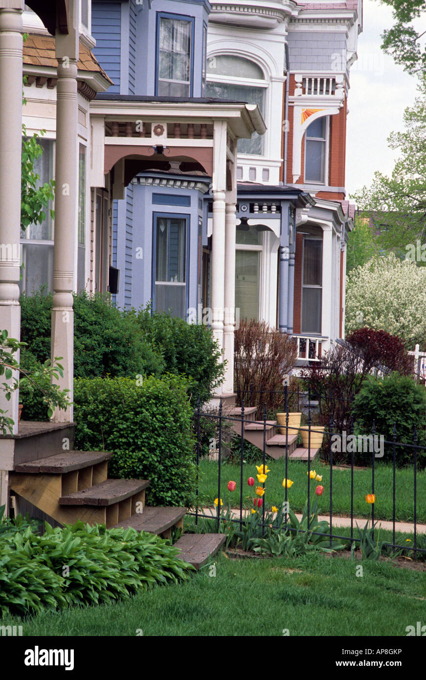 ROW OF RESTORED VICTORIAN HOMES IN THE CATHEDRAL HILL NEIGHBORHOOD OF ST. PAUL, MINNESOTA. SPRING. Stock Photo