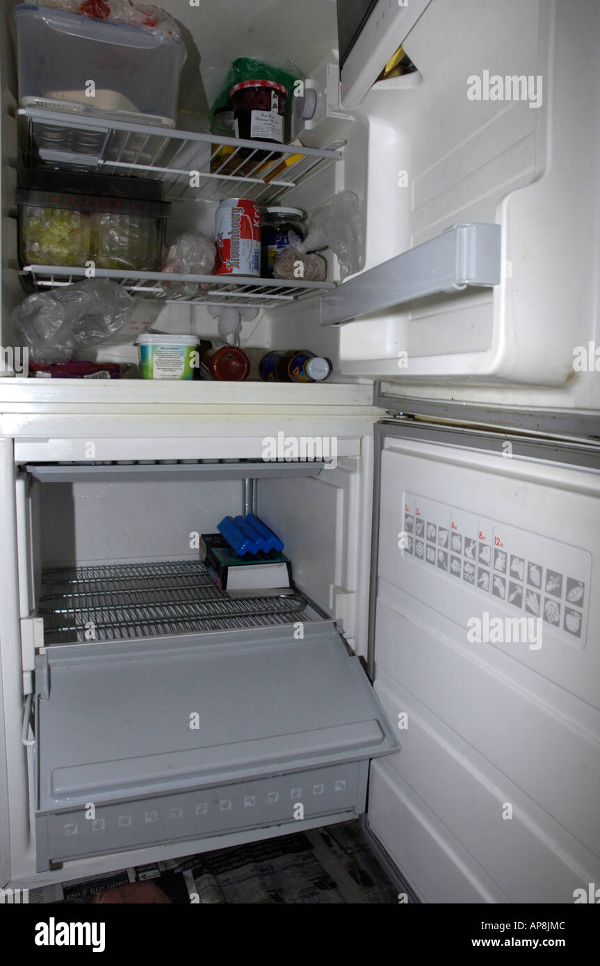 Defrosting Fridge-Freezer Stock Photo